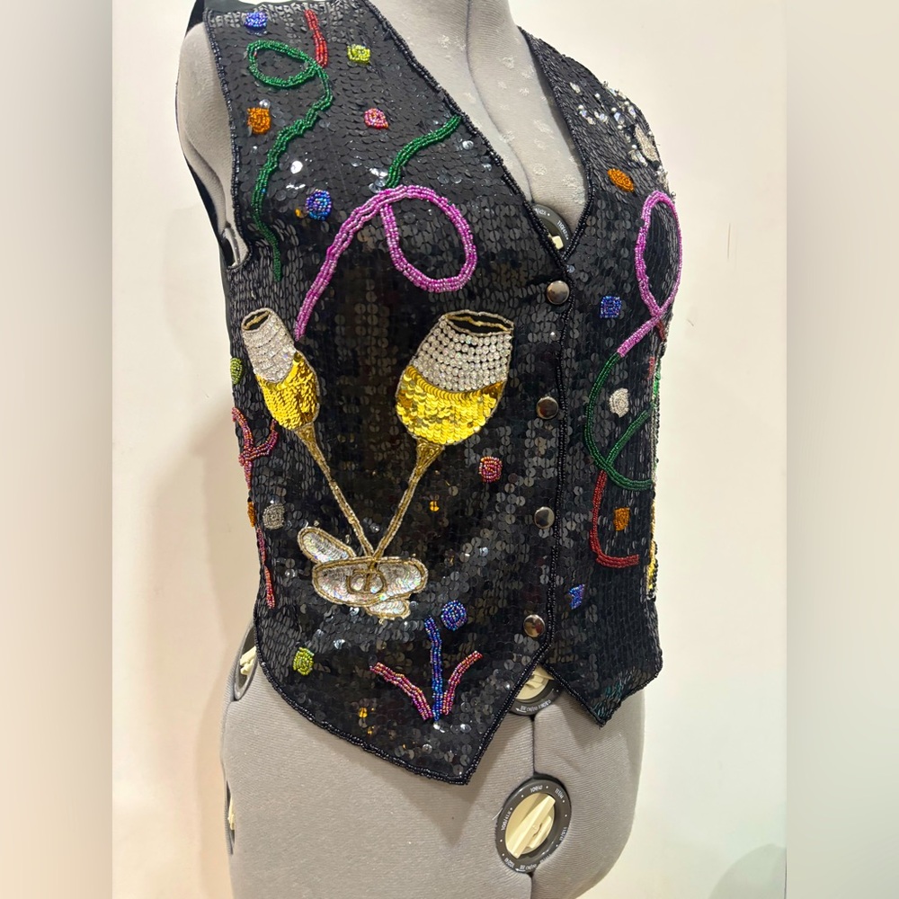 Vintage New Year's beaded & Sequin vest.
Perfect for any celebration or party!